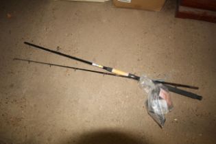 A Red Wolf two piece fishing rod with various reel