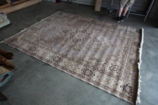 An approx. 11'1" x 8' 3" patterned rug