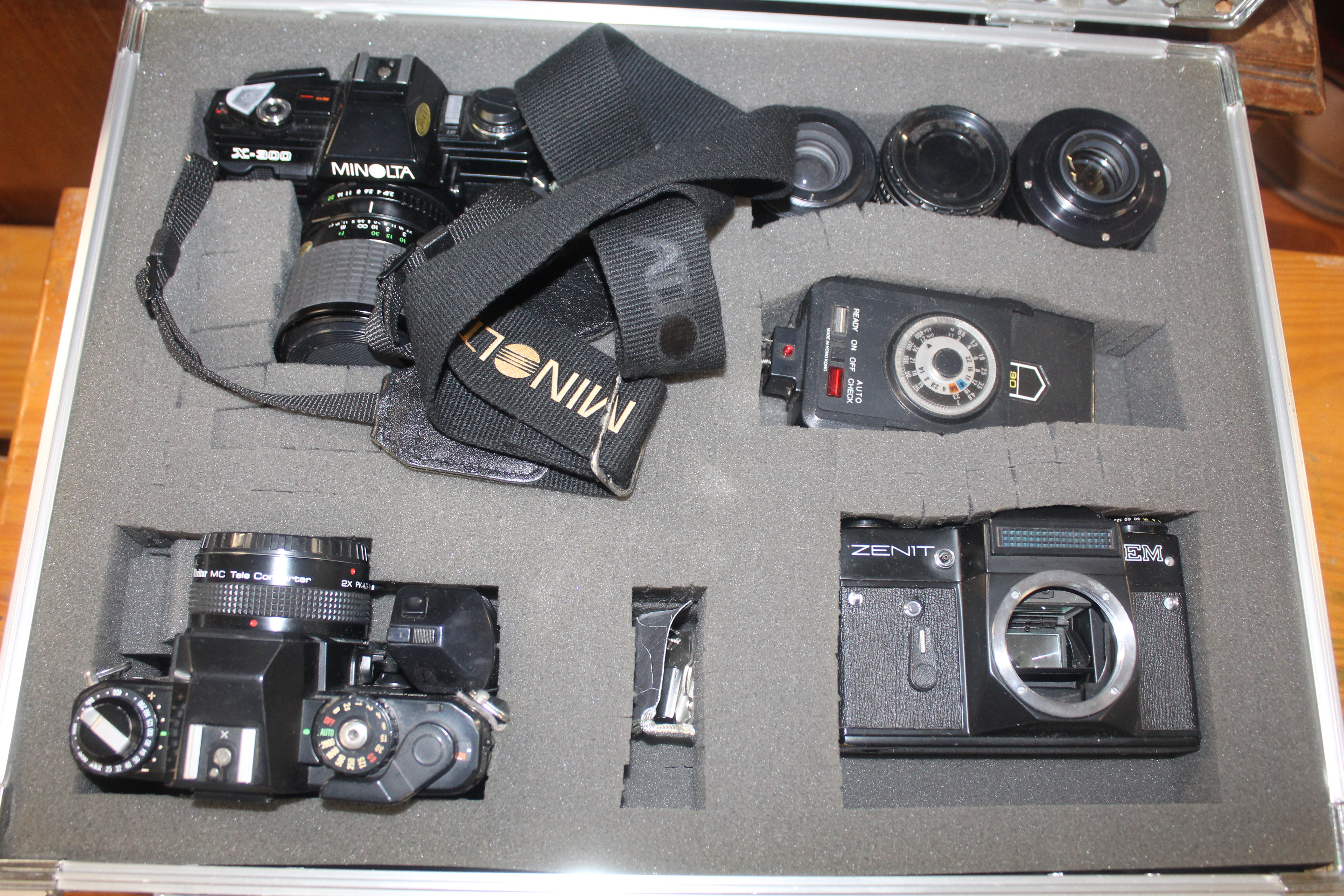 A case containing Minolta X300 camera, a Chinon CE - Image 2 of 2