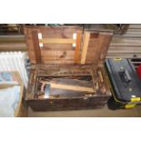 A large pine chest with split lid and contents of
