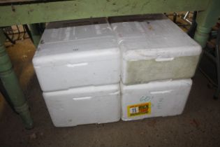 Four polystyrene packaging boxes