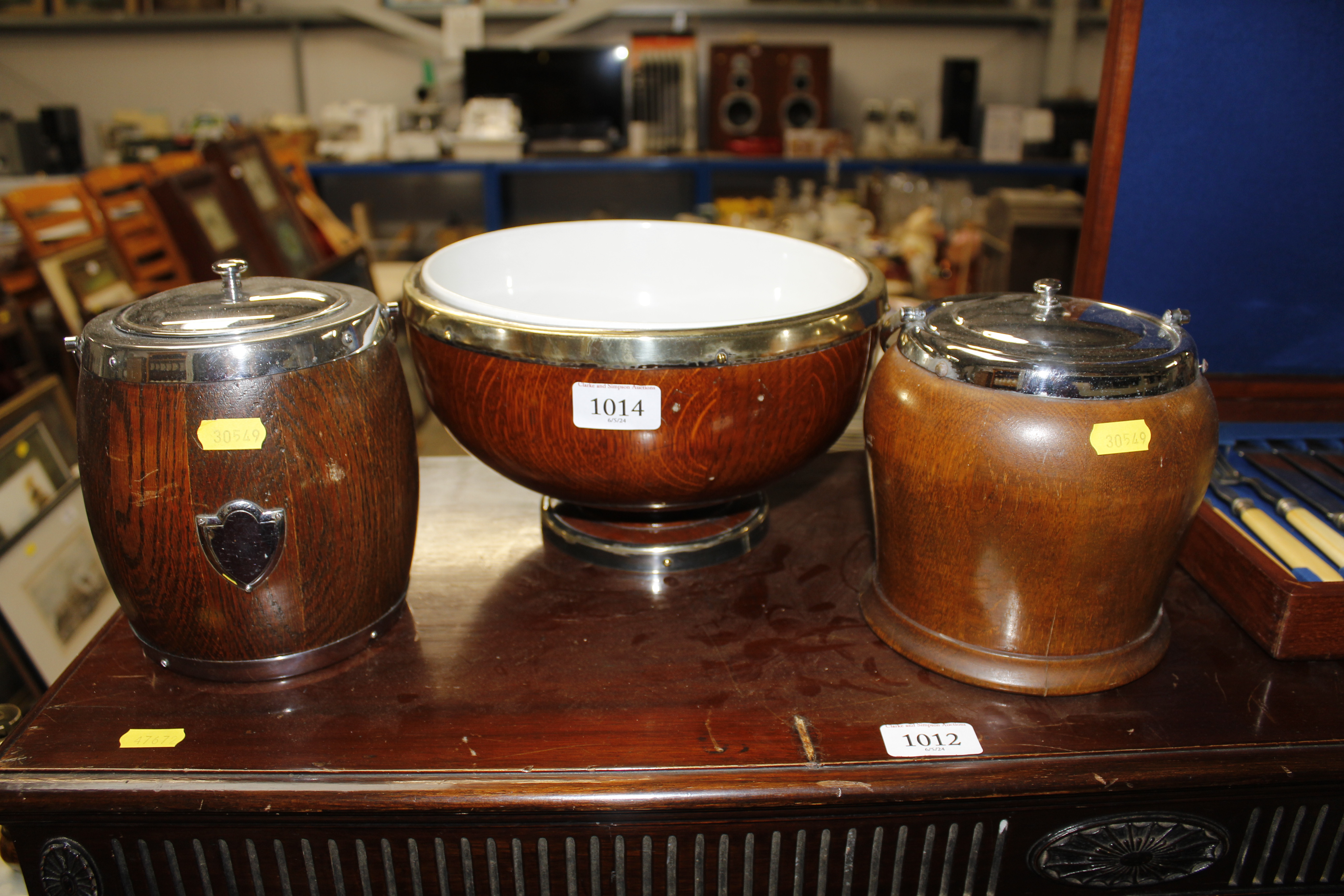 An oak and silver plate mounted bowl and two simil