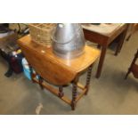 An oak gateleg tea table