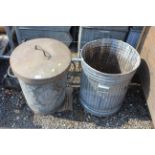 Two metal dustbins, one with lid
