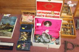 Four jewellery boxes and contents of various costu