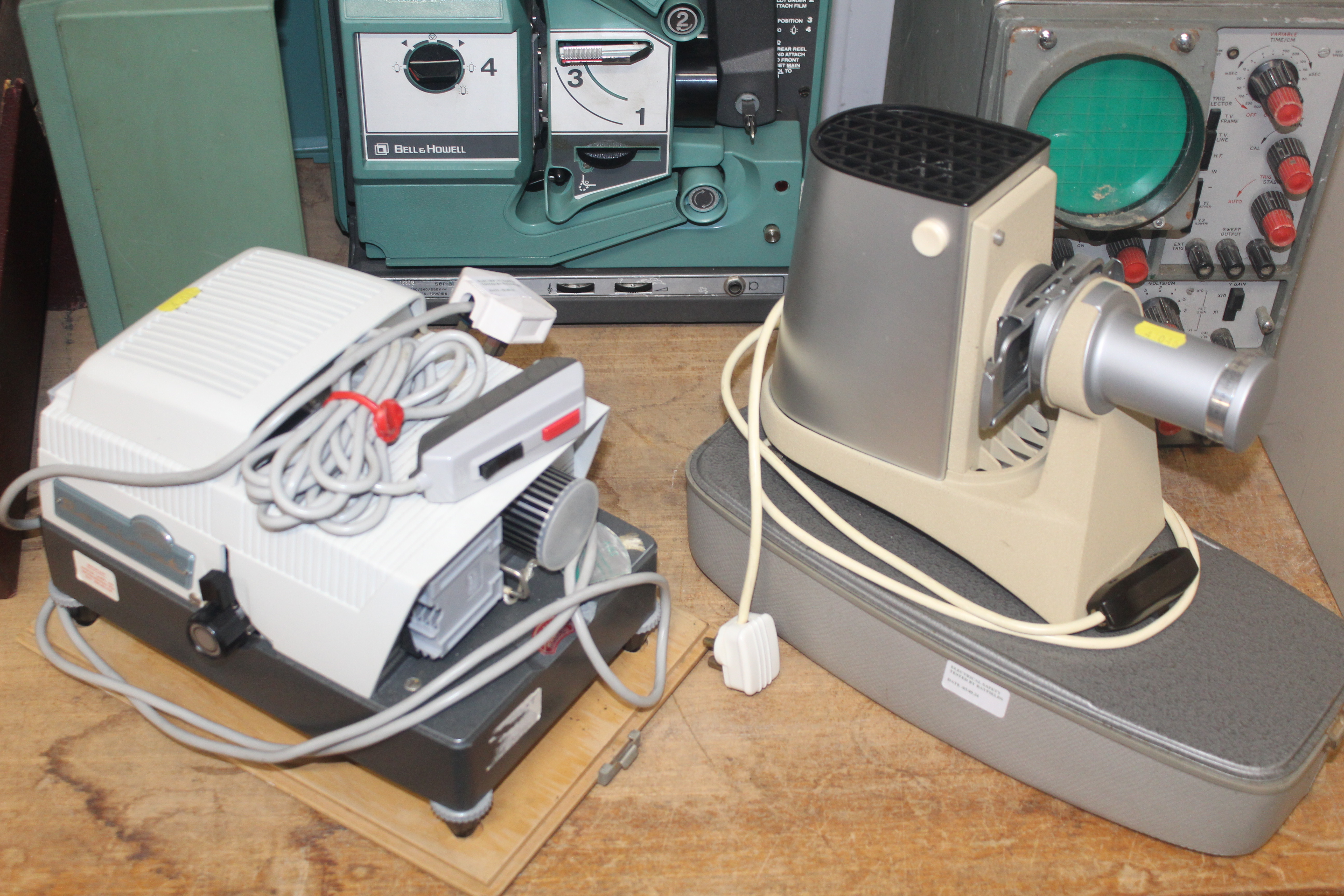 A Bell & Howell 1680 projector, a Braun projector, a Leitz projector and a Telequipment tester and a - Image 2 of 4