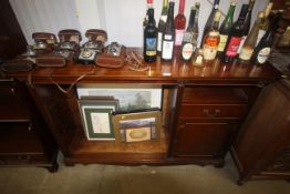 A reproduction mahogany bookcase with adjustable s