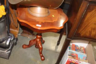 An inlaid occasional table raised on tripod base