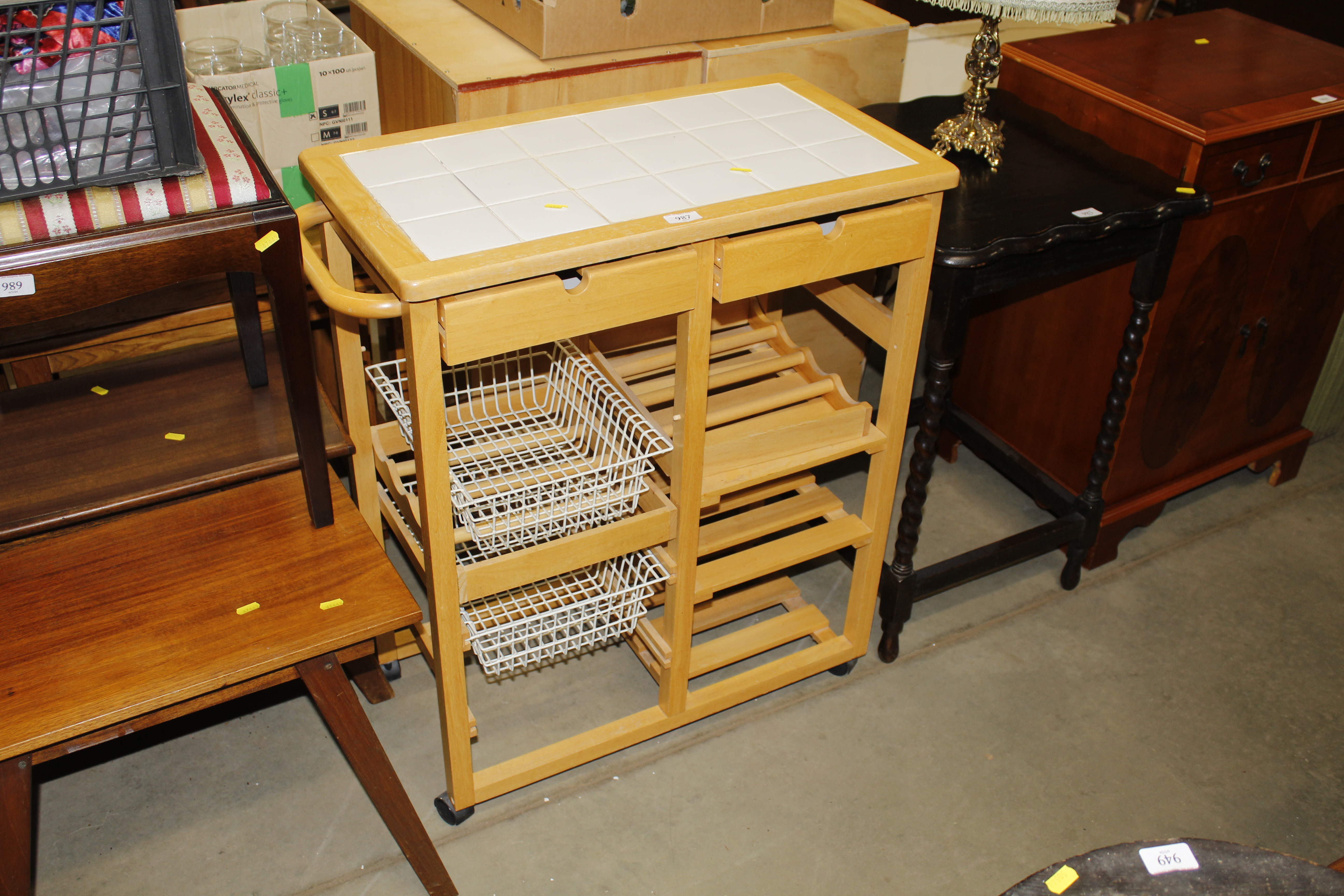 A tile topped kitchen trolley