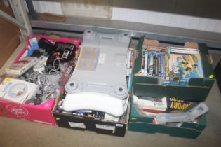 Four boxes of various computer games and accessori