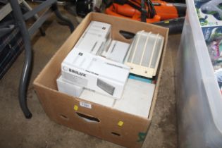 A box containing various outdoor light fittings