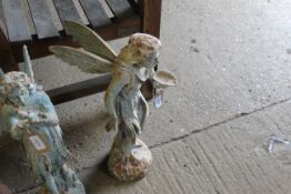 A cast iron statue of a standing fairy (123)