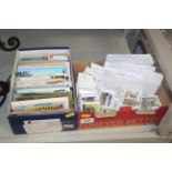 A box of various postcards and a box of collectors