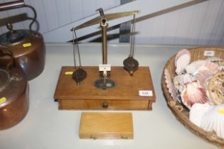 A set of Co-operative scales and collection of weights