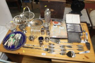 A collection of metal ware to include cutlery, cru