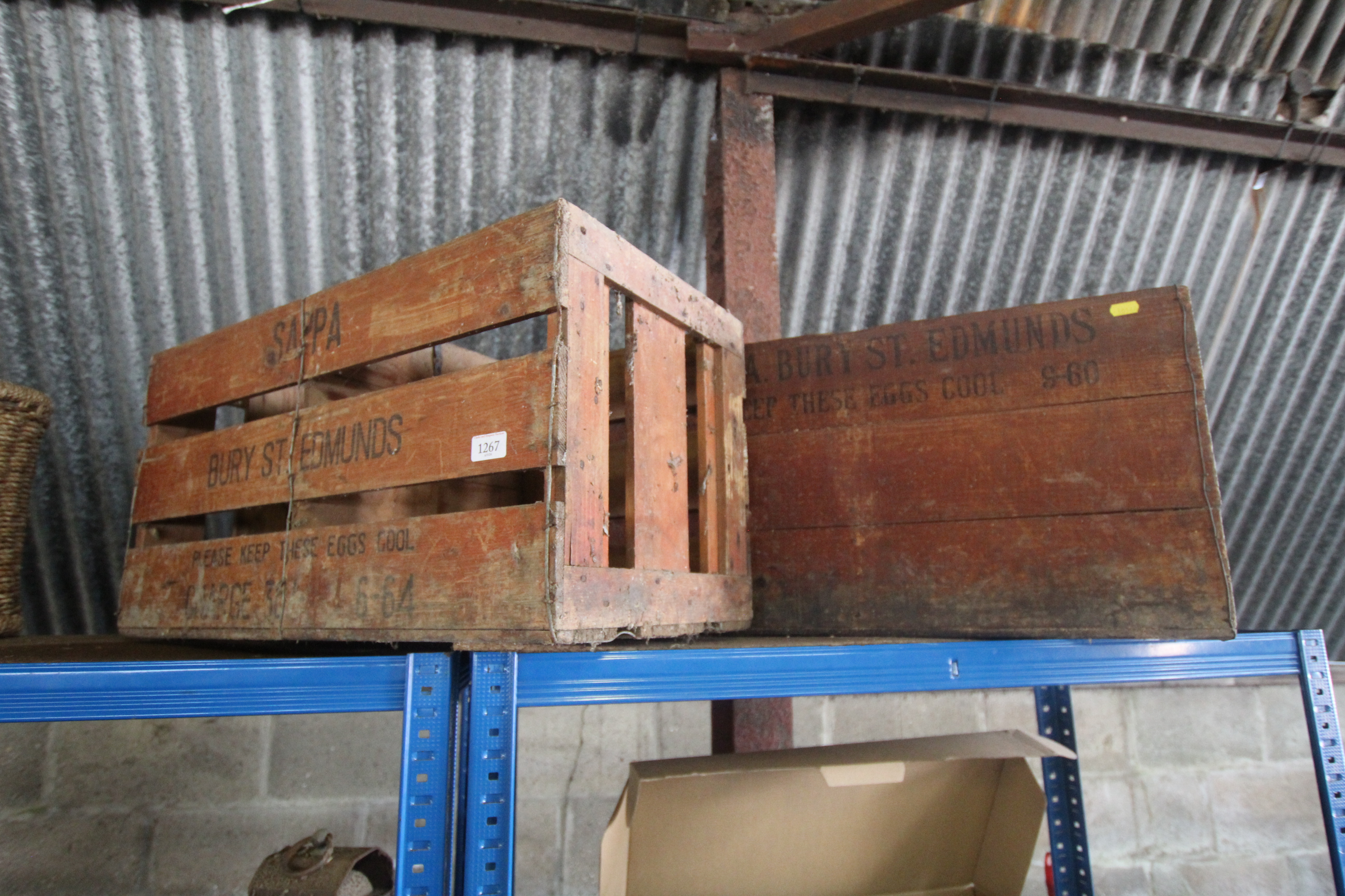 Two wooden egg packing crates ' S.A.P. P.A. of Bur