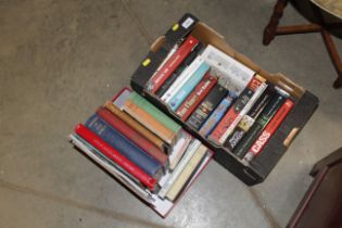 Two boxes of books and a stamp album