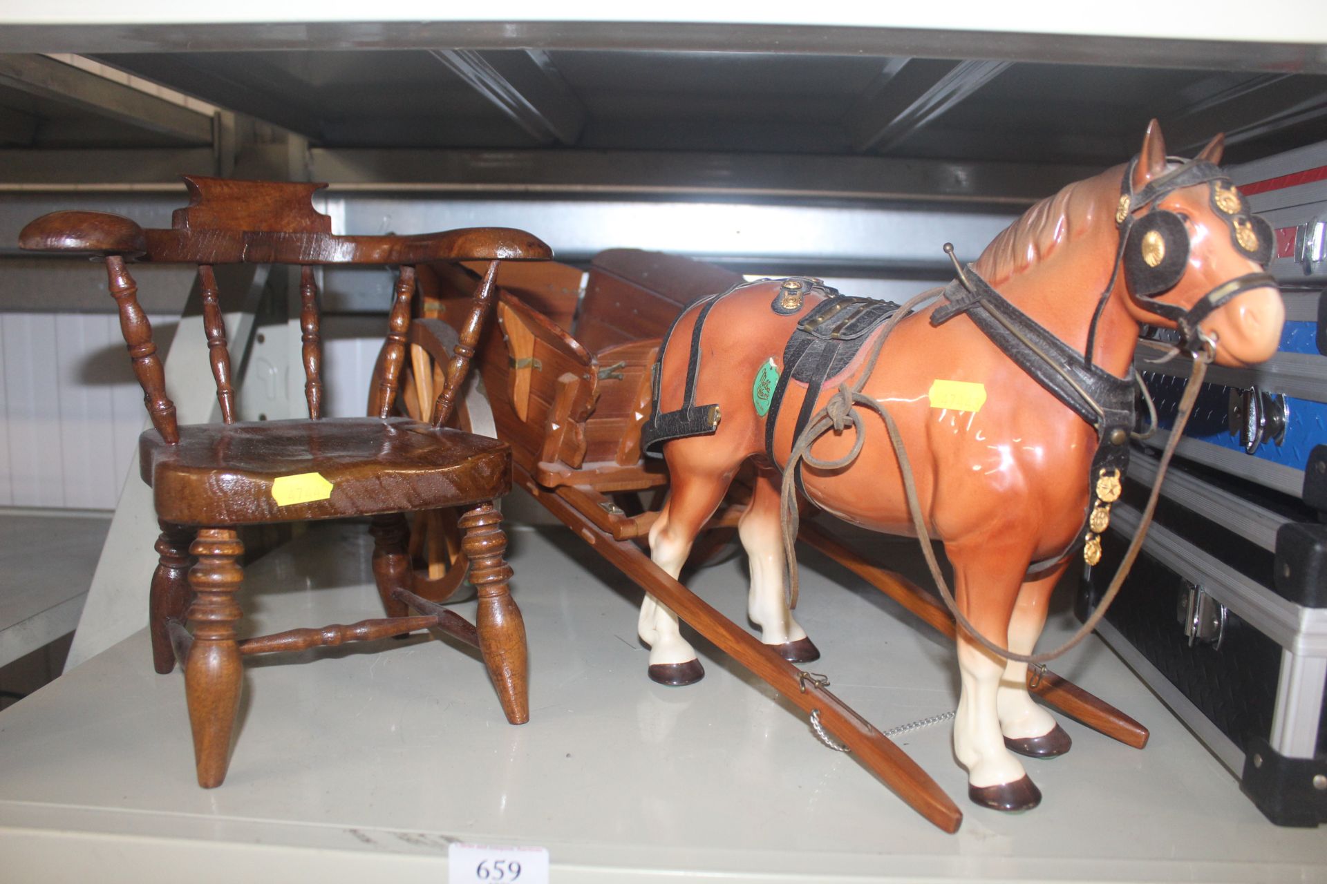 A Melba Ware horse and cart and a dolls captains c