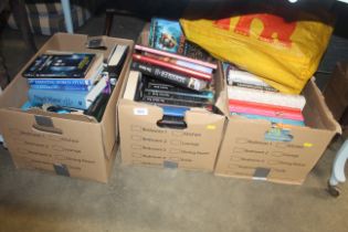 Three boxes and a bag of various books