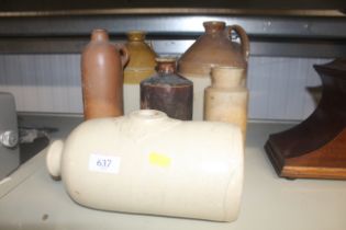 A collection of stoneware and bottles