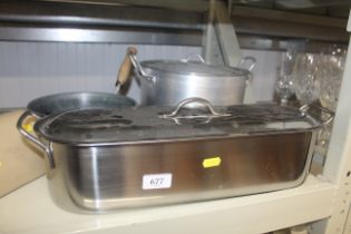 A stainless steel fish kettle, twin handled cooking pot and cooking pan