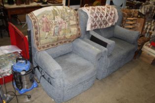 An upholstered reclining two seater settee and matching armchair