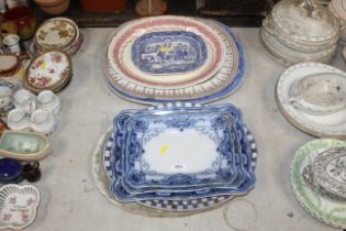 A collection of various patterned meat plates