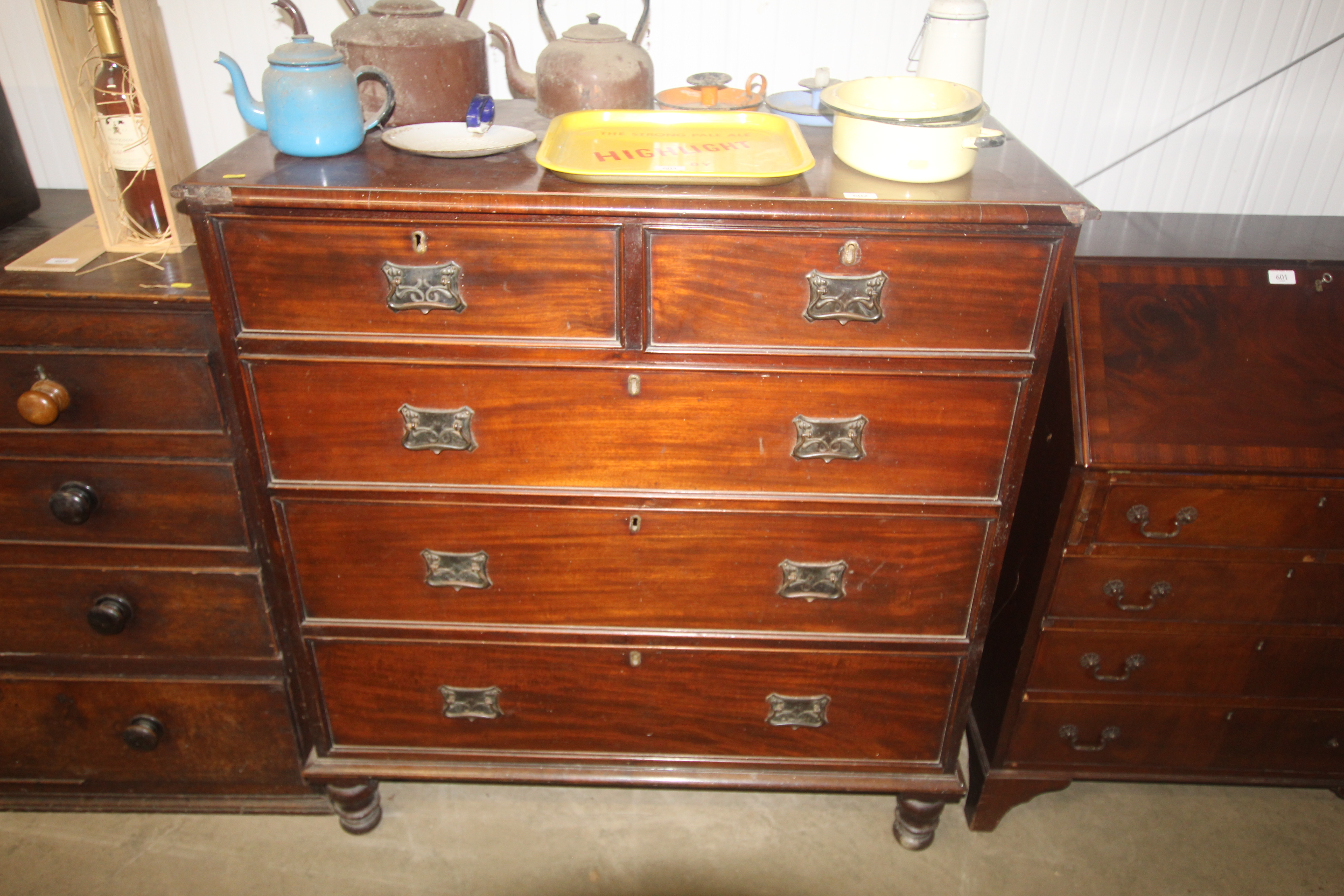 A mahogany chest fitted two short over three long drawers with Art Nouveau style handles AF