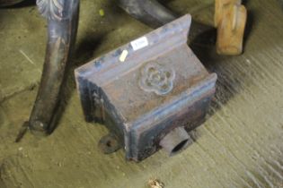 A painted cast iron rain hopper with patterned mot