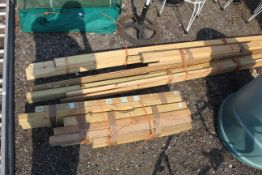 A quantity of various lengths of timber. skirting