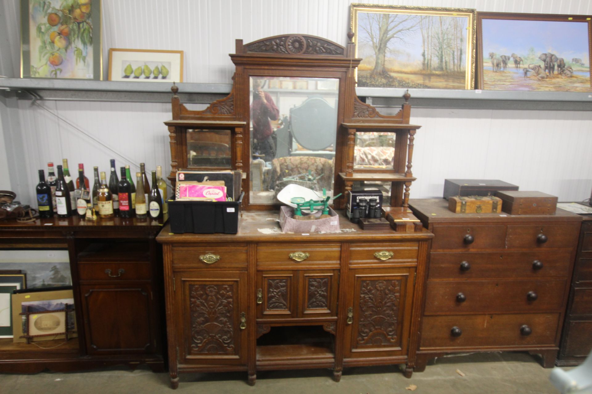 A late Victorian carved mahogany mirror backed sid