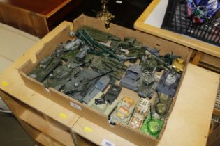 A collection of vintage die-cast military vehicles