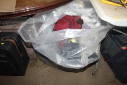 A bag containing various holdalls, bags etc.