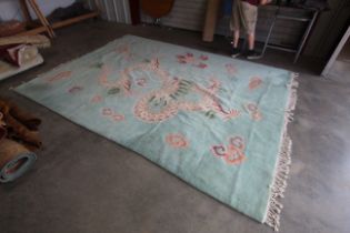 An approx. 12'7" x 9' Chinese style patterned rug