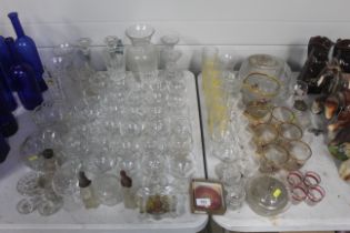 A collection of various table glassware to include