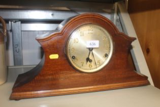 An Edwardian mahogany cased three hole mantel clock