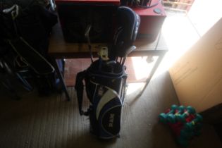 A Ram golf bag and contents of children's golf clu