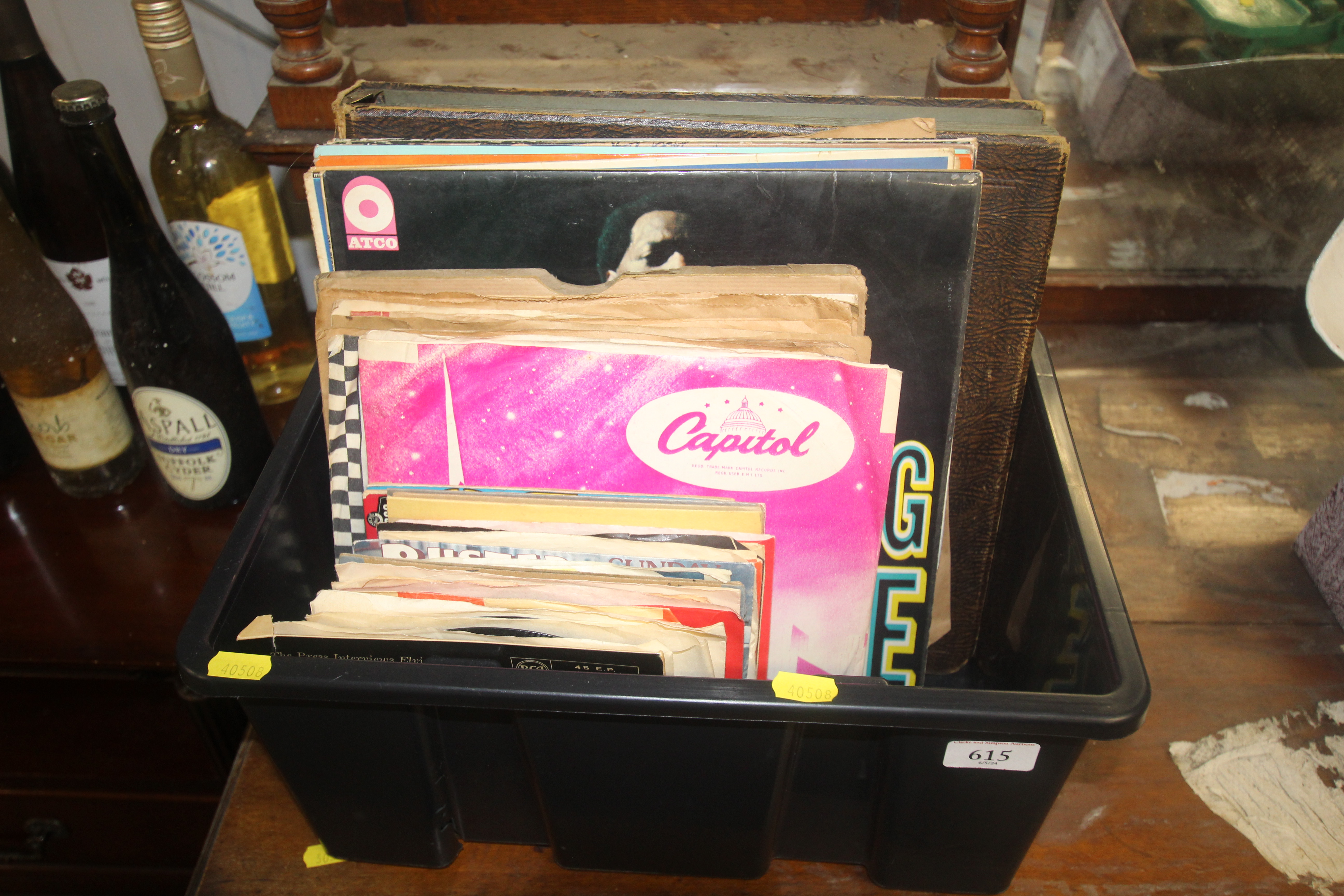 A box of various records