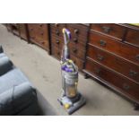 A Dyson DCO4 upright vacuum cleaner