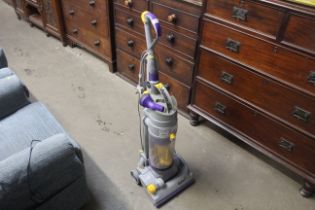 A Dyson DCO4 upright vacuum cleaner