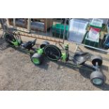 Two low slung skid steer children's pedal tricycles AF