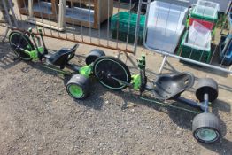 Two low slung skid steer children's pedal tricycles AF