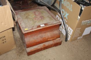 A commode enclosed within a wooden case, with embr