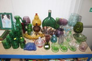 A collection of coloured glassware to include various goblets and sundae dishes etc