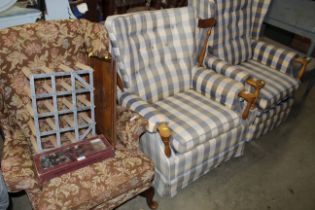 A button back upholstered and wooden framed rocking chair