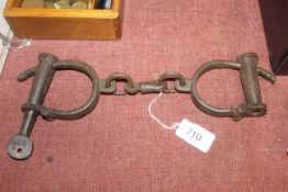 A pair of handcuffs (157)
