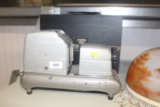 A slide projector with fitted case