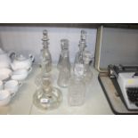 A Baccarat glass decanter and stopper and various