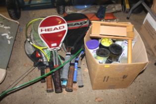 A quantity of various sports racquets, a Sherwood Forester archery bow, a quantity of tennis