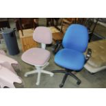 Two swivel office chairs